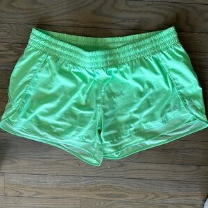 Athleta Xl 4” mesh racer